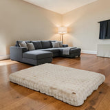 Happy Animalia beige plush pet bed with orthopedic foam and non-slip base.