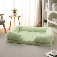 Happy Animalia light green plush pet bed with raised edges for comfort and security.