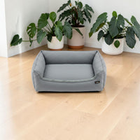 Happy Animalia large grey plush dog bed with raised sides for comfort and support, ideal for large breeds.