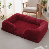 Happy Animalia plush dog and cat bed in deep red, with raised edges for comfort and security. Soft, fluffy material.