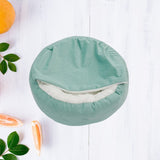 Happy Animalia small orthopedic dog bed in teal with plush white interior. Features raised sides for security and memory foam for joint support.