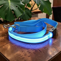 Happy Animalia blue nylon LED dog leash with USB charging and multiple light modes for night visibility.